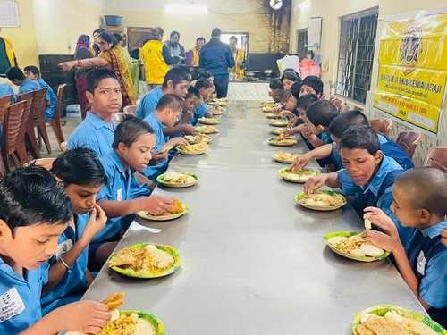 Distribution of food to the Mentally challeged children at Chetna by LCB Netaji